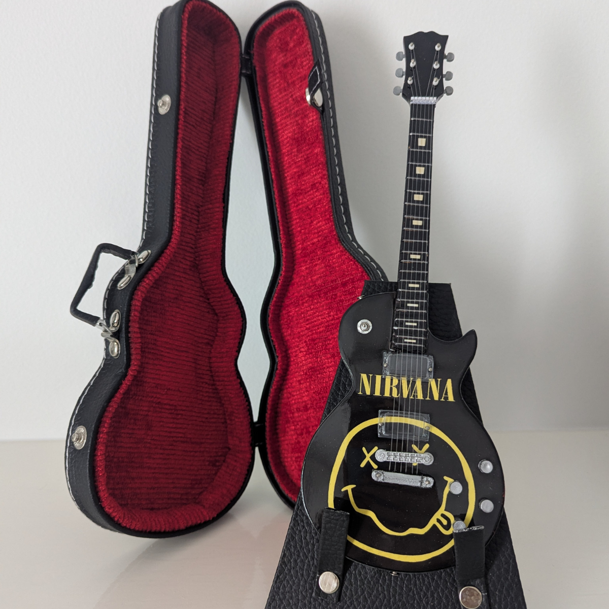 Nirvana - Miniature Guitar with Stand & Case