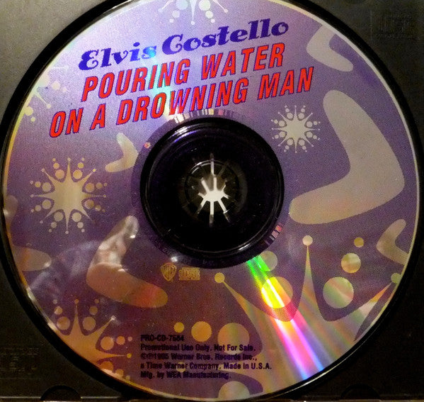 Elvis Costello – Pouring Water On A Drowning Man Promo CD