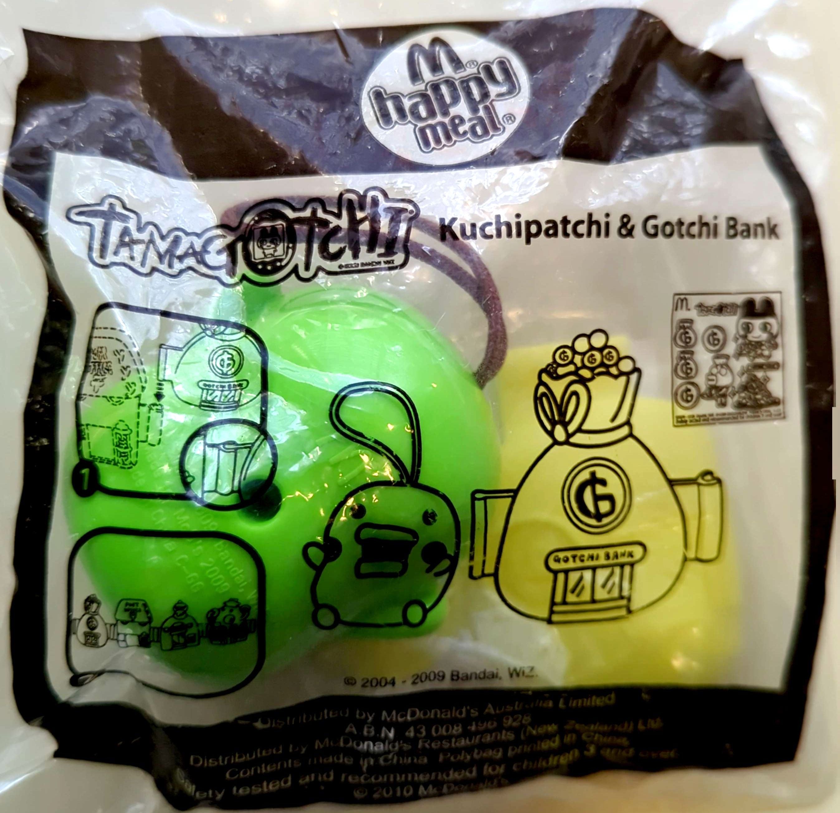 McDonalds Happy Meal Toy - Tamagotchi Kuchipatchi & Gotchi Bank 2010 (New & Sealed)
