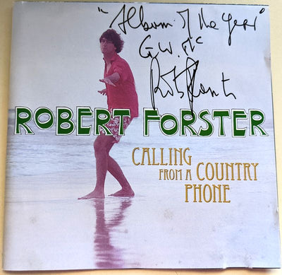Signed CD cover of Robert Forster's album 'Calling From A Country Phone' with the signature in black ink.