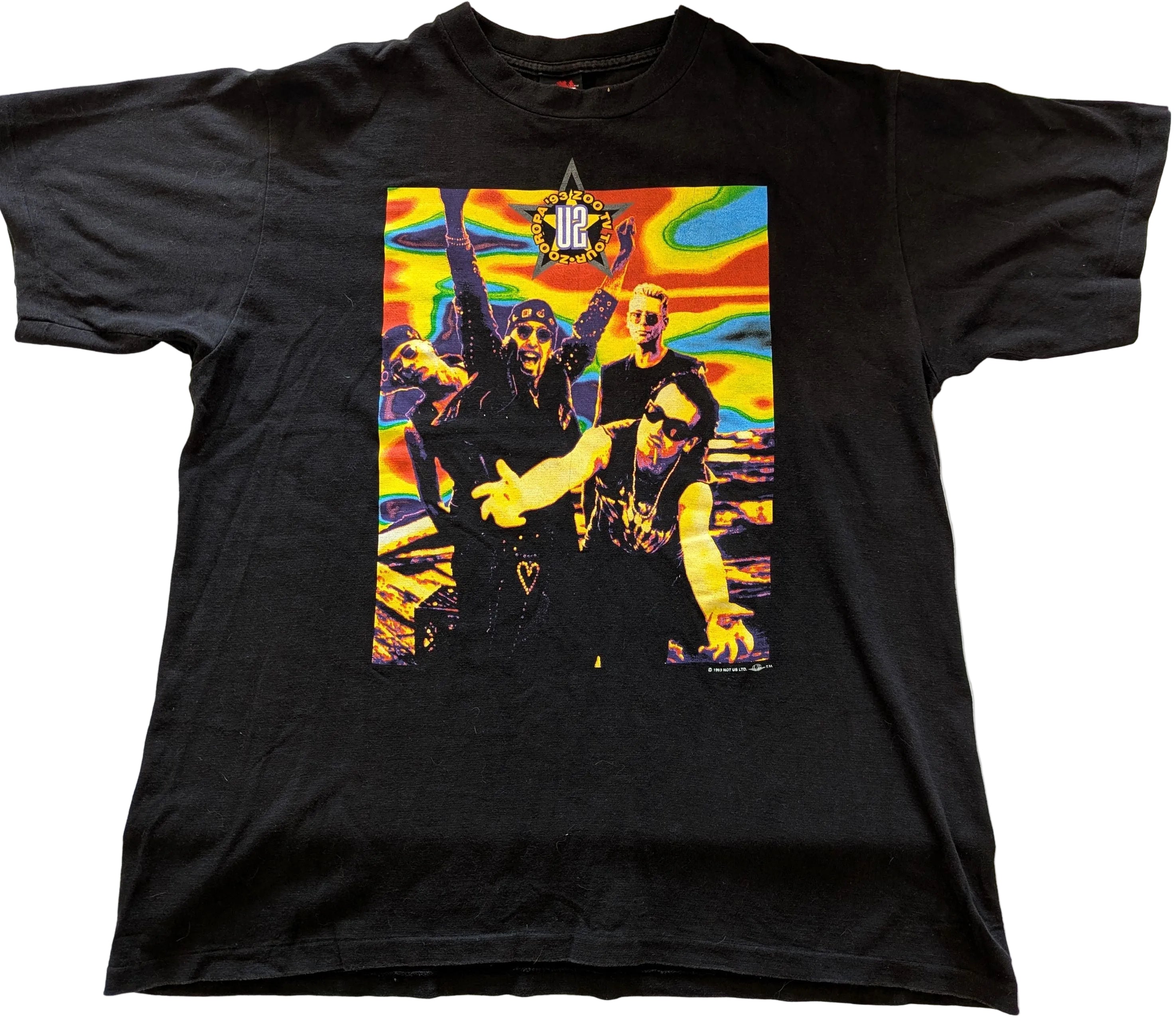 Black t-shirt with a colorful graphic design of 3 people U2 band members