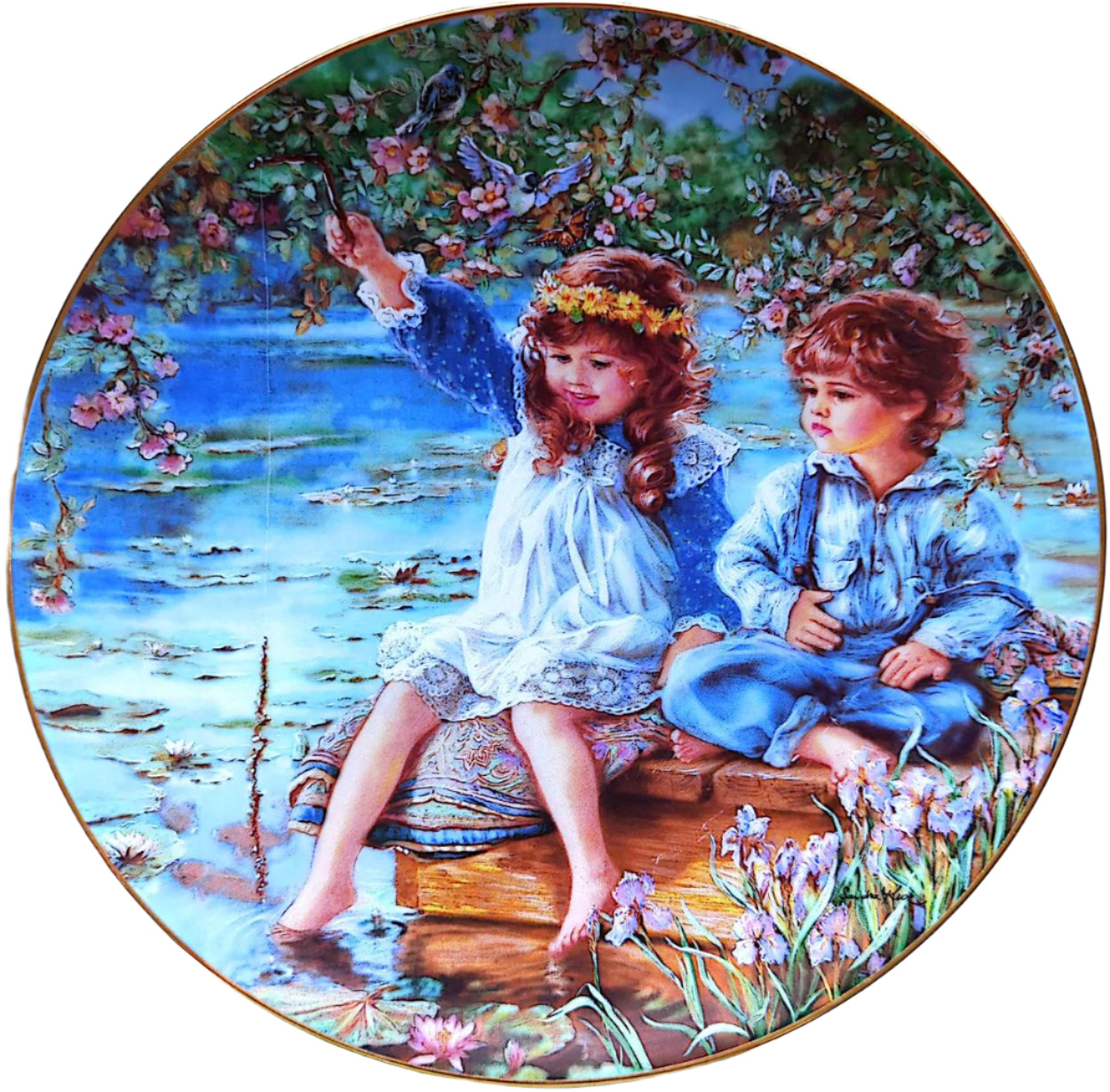 A decorative plate featuring two children sitting by a pond surrounded by flowers, with a blue, green, and white color palette.