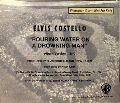 Elvis Costello – Pouring Water On A Drowning Man Promo CD