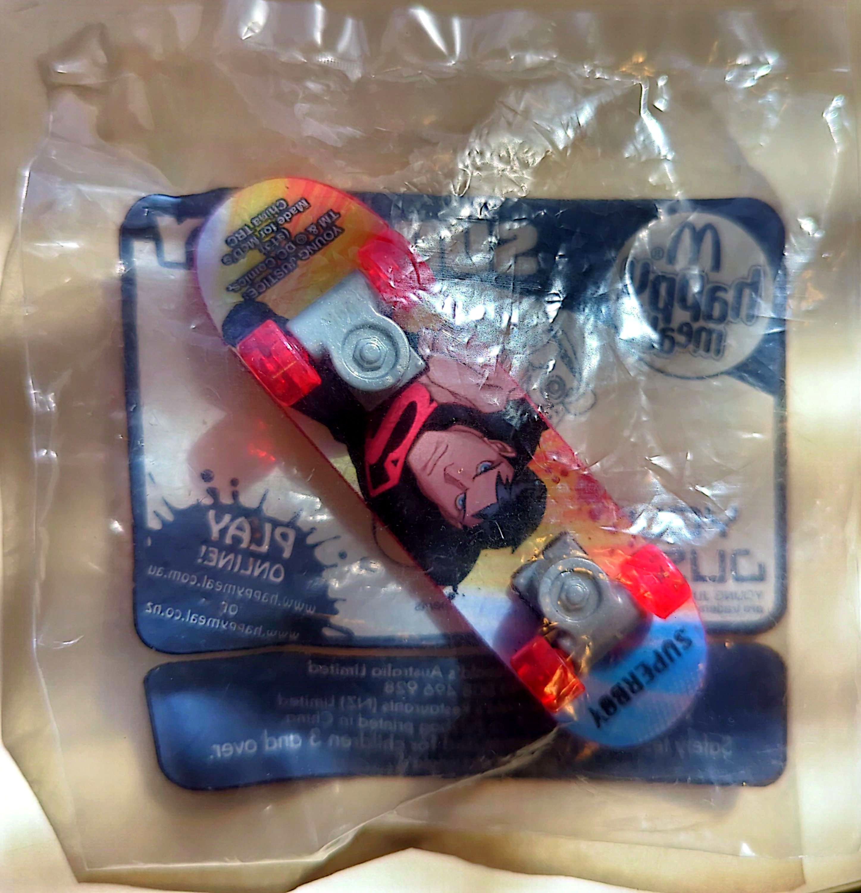 McDonalds Happy Meal Toy - Young Justice Superboy Skateboard 2013 (New & Sealed)