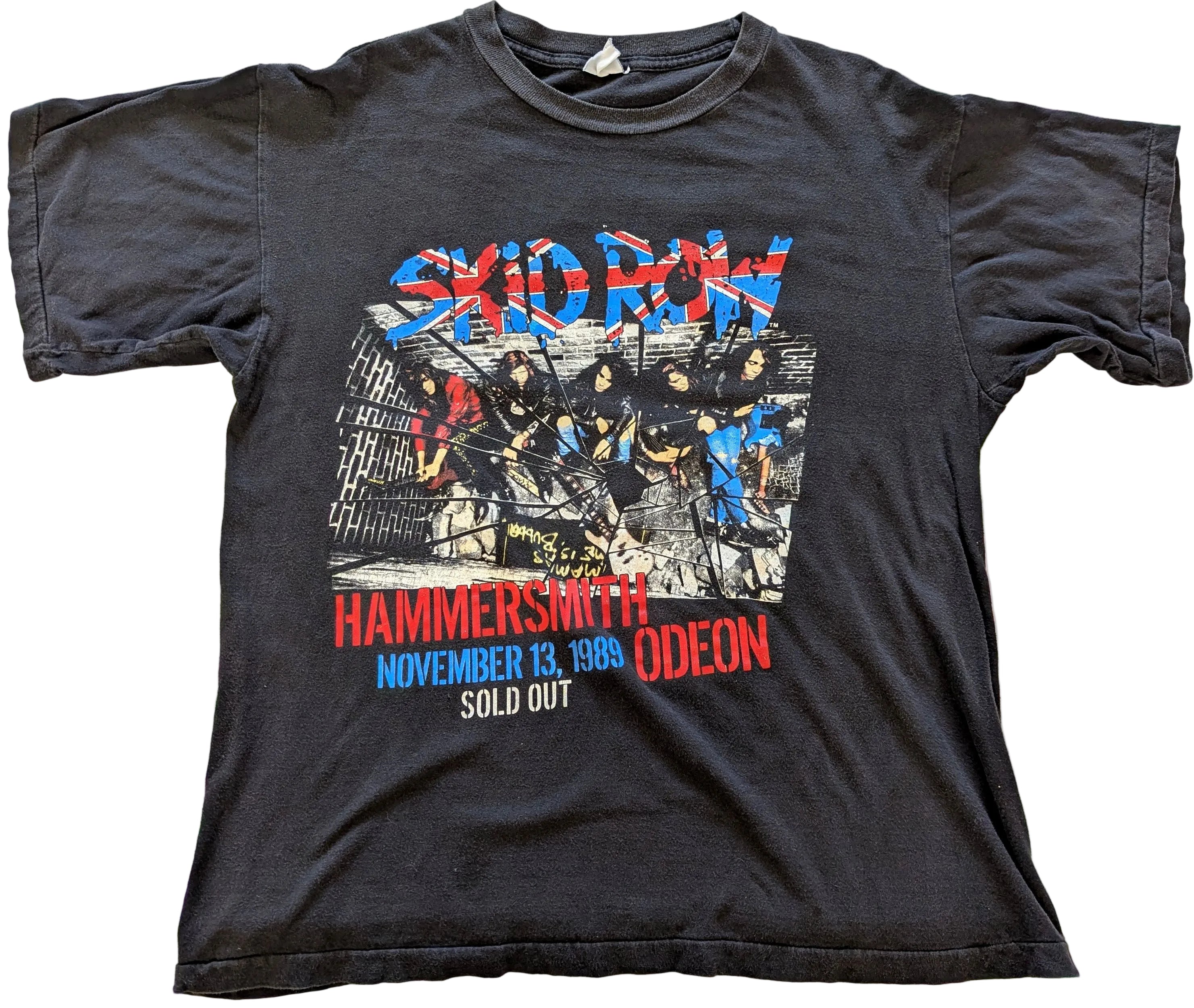 Black t-shirt with colorful Skid Row graphic design on a white background